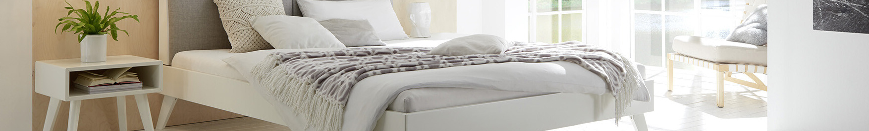 Wit houten bedden